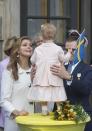 <p>Princess Madeleine dotes on her niece, Princess Estelle, during a gathering for King Carl Gustaf's 40th Jubilee.</p>