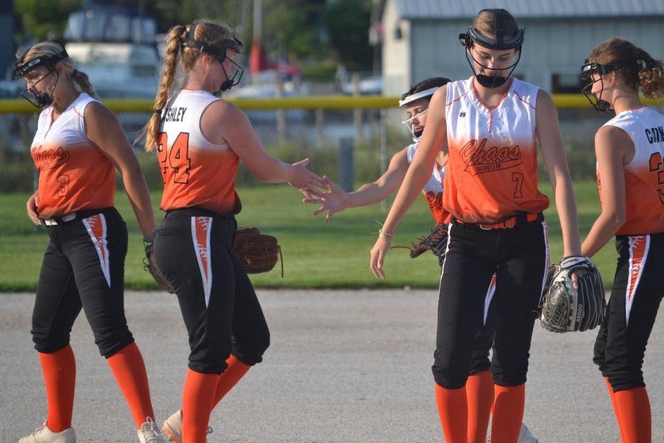 Cheboygan Chaos softball players celebrate during a 14U game during last summer's Chaos Clash tournament in Cheboygan. The 4th Annual Chaos Clash tournament, which will consist of four different divisions, will be held in Cheboygan Friday-Sunday.