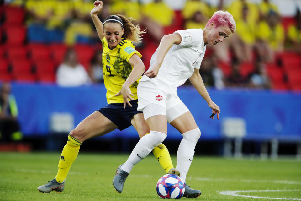 (L-R) Kosovare Asllani of Sweden Women, Sophie Schmidt of Canada Women during the World Cup Women match between Sweden v Canada at the Parc des Princes on June 24, 2019 in Paris France (Photo by Eric Verhoeven/Soccrates/Getty Images)