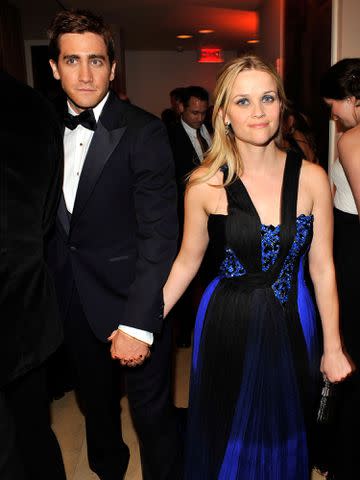 <p>Kevin Mazur/VF/WireImage</p> Jake Gyllenhaal and Reese Witherspoon attends the 2009 Vanity Fair Oscar party on February 22, 2009 in West Hollywood, California.