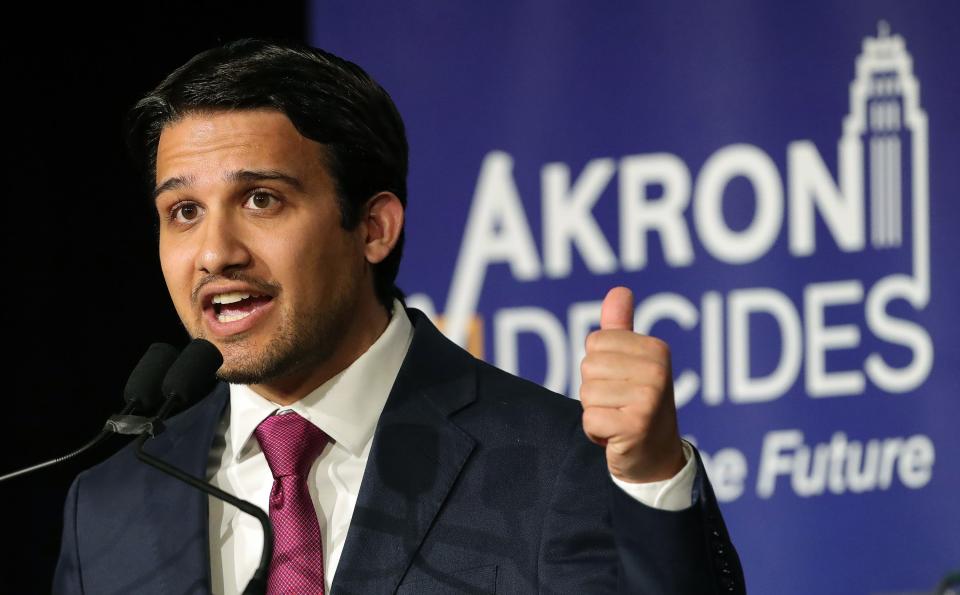 Akron Ward 8 Councilman Shammas Malik responds to a question during the Akron Decides: Debating the Future mayoral debate Wednesday at Quaker Station in Akron.