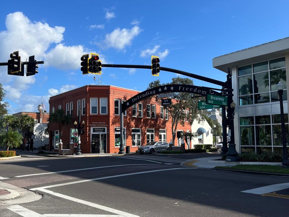 Dunedin, Florida, has an arch in the center of town that reads, "Defending Freedom." Dunedin is the town where Florida Gov. Ron DeSantis spent most of his youth.