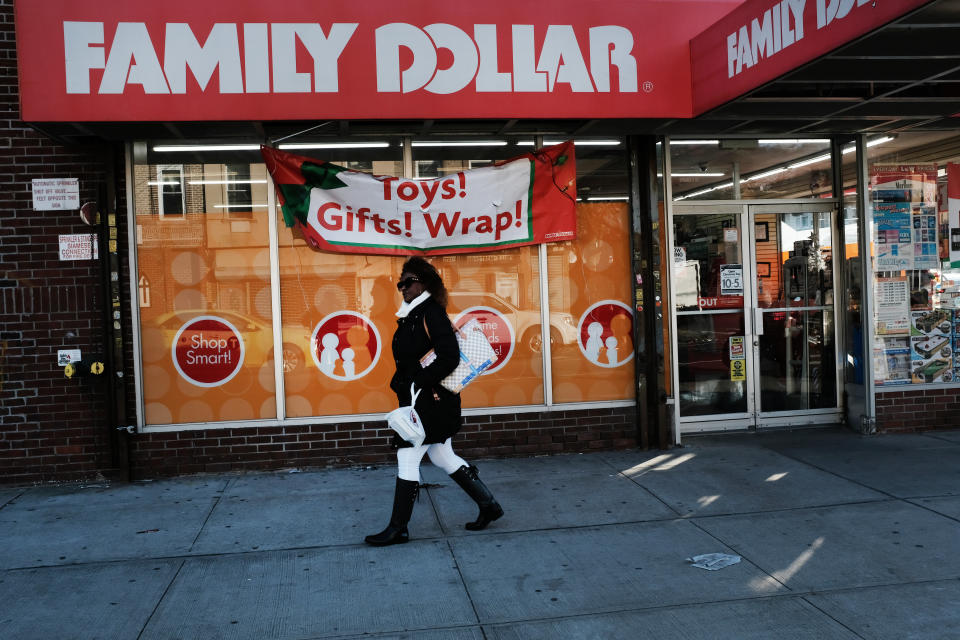 NEW YORK, NEW YORK - DECEMBER 11: A woman walks by a Family Dollar store on December 11, 2018 in the Brooklyn borough of New York City. As the income gap between rich and poor continues to grow, dollar and 99 cent stores have become increasingly popular in both urban and rural America. Dollar General, one of several discount retail chains, has become one of the fastest growing retailers in the U.S. According to the Institute for Local Self Reliance, there are now over 30,000 dollar stores in the U.S., up from around 18,000 a decade ago. Dollar General and Dollar Tree alone are expected to have 50k stores in the next few years.  (Photo by Spencer Platt/Getty Images)