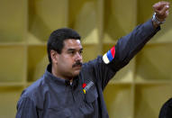 Sin el carisma que protegió a Hugo Chávez de las fallas de su gestión, el presidente interino Nicolás Maduro debió encarar el problema de inseguridad en Venezuela, prometiendo devolver la paz si gana las presidenciales del 14 de abril, pese a que el aumento de los homicidios ha seguido imparable en 14 años de chavismo. (AFP/Archivo | Juan Barreto)