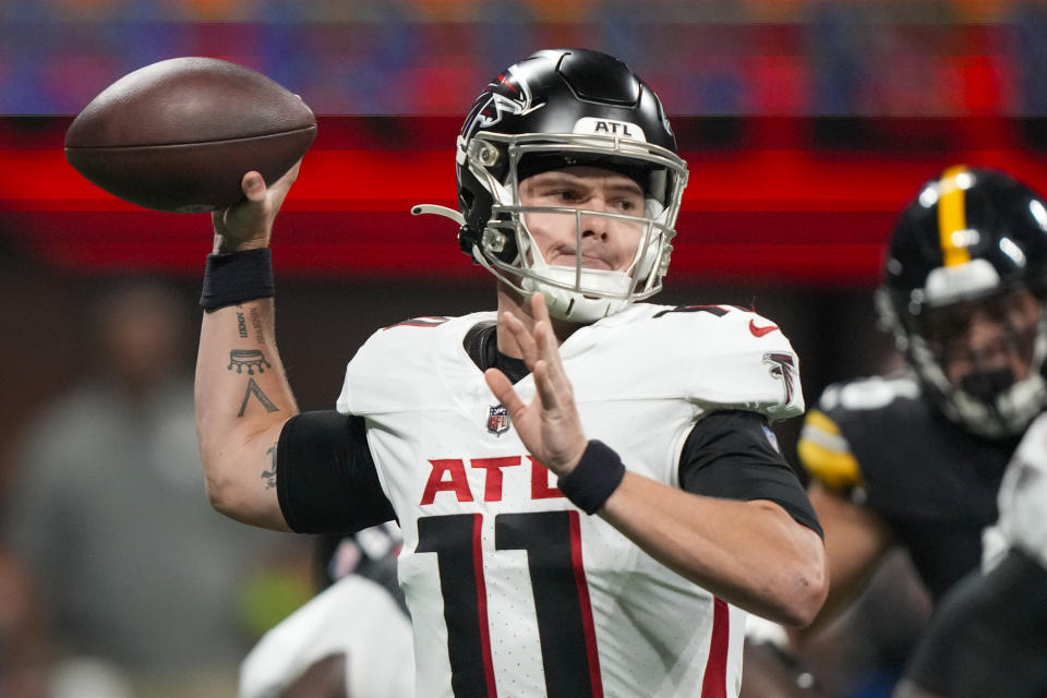 Atlanta Falcons quarterback Taylor Heinicke passes against the Pittsburgh Steelers during the first half of a preseason NFL football game Thursday, Aug. 24, 2023, in Atlanta. (AP Photo/Gerald Herbert)