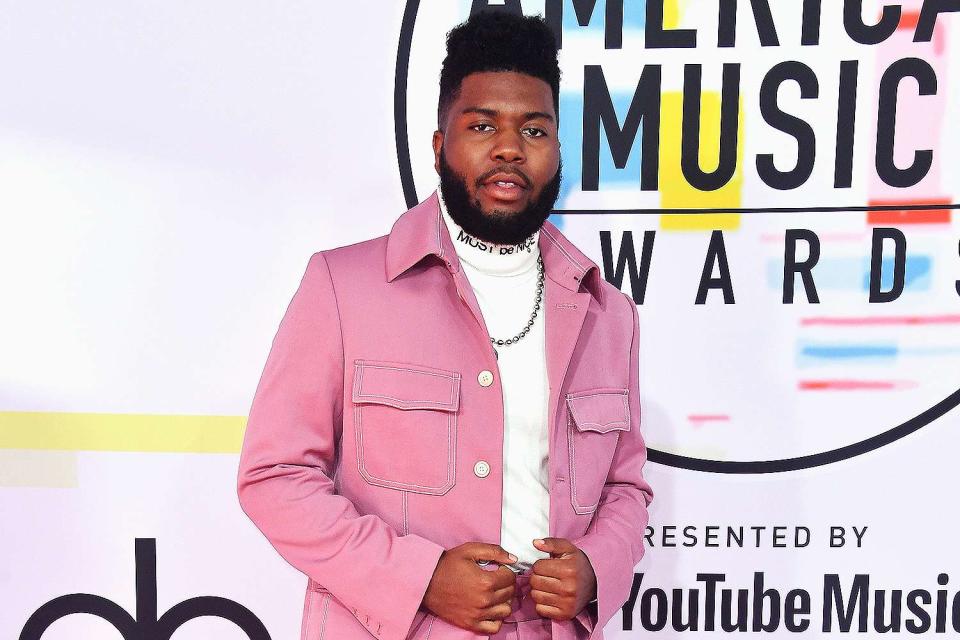 <p>Frazer Harrison/Getty Images)</p> Khalid attends the 2018 American Music Awards.