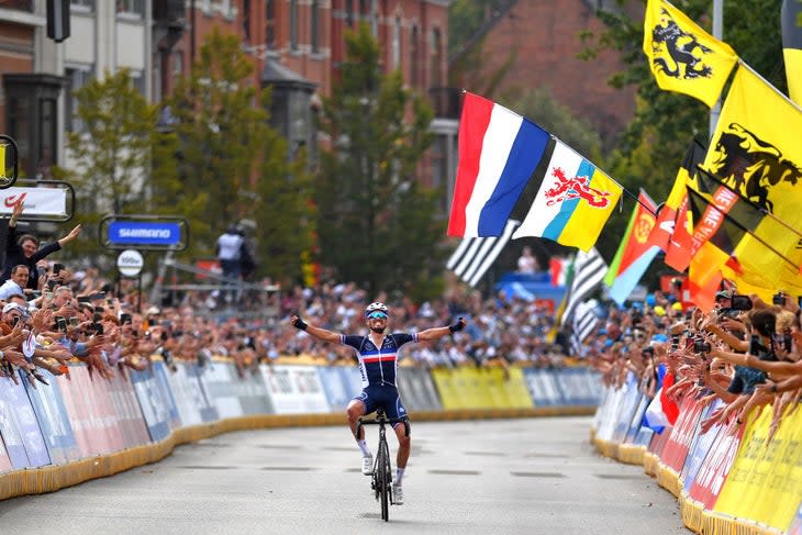 Julian Alaphilippe crosses the line to win his second world title