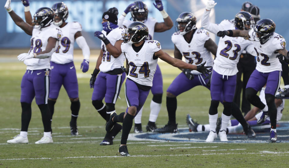 Marcus Peters (24) and the Ravens wave goodbye to the Titans after beating them in the AFC wild-card playoffs. (Photo by Wesley Hitt/Getty Images)