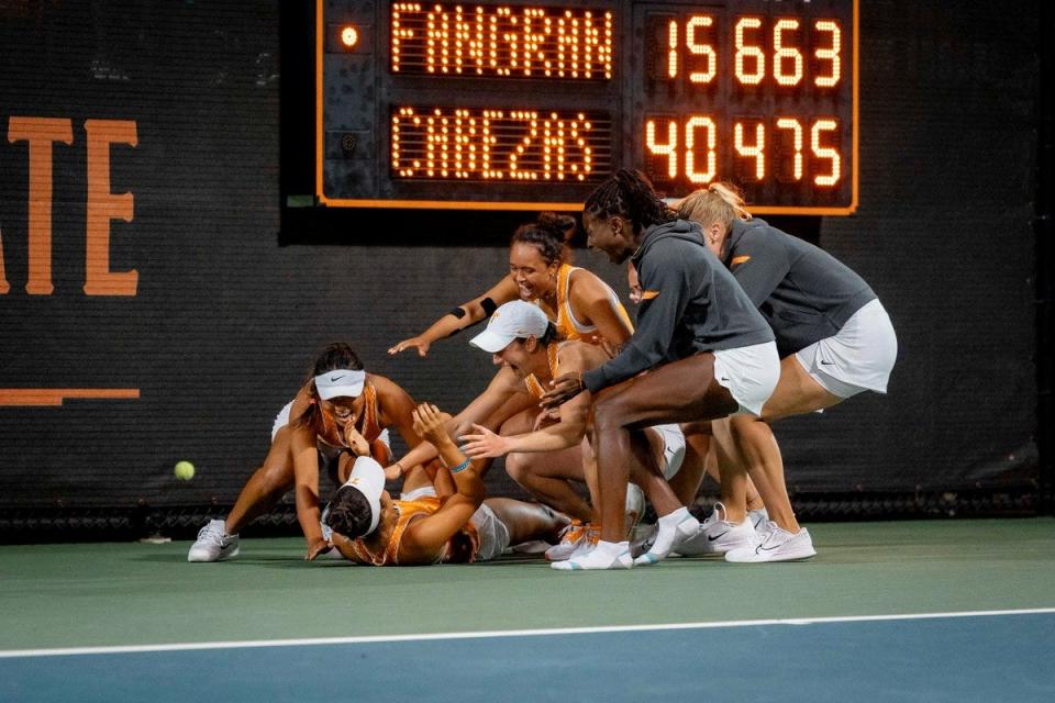 Tennessee women's tennis rushes to celebrate after senior Sofia Cabezas won her singles match to secure the 4-3 upset over UCLA. The Lady Vols advanced to the NCAA Final Four for the first time since 2002.