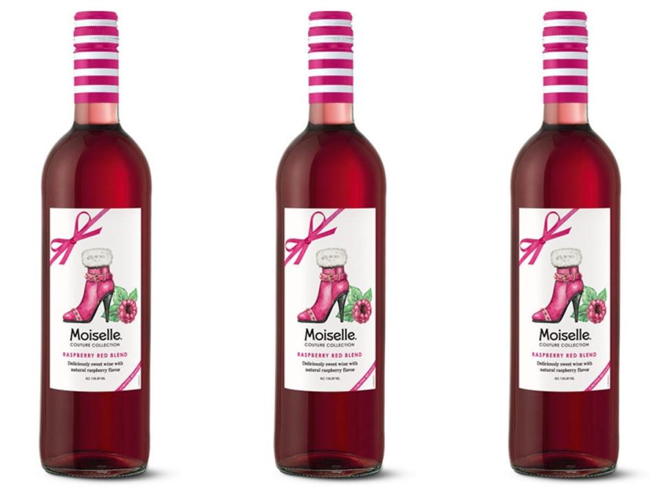 red and white bottles of raspberry wine from Aldi