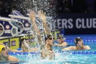 Caeleb Dressel reacts after winning the men's 100 freestyle during wave 2 of the U.S. Olympic Swim Trials on Thursday, June 17, 2021, in Omaha, Neb. (AP Photo/Jeff Roberson)