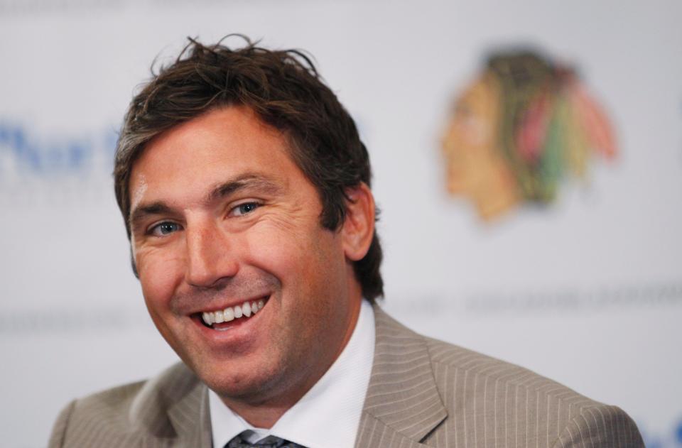 Andrew Brunette, shown here when he signed with the Chicago Blackhawks in 2011, is expected to be named as the Nashville Predators new head coach. (AP Photo/M. Spencer Green)