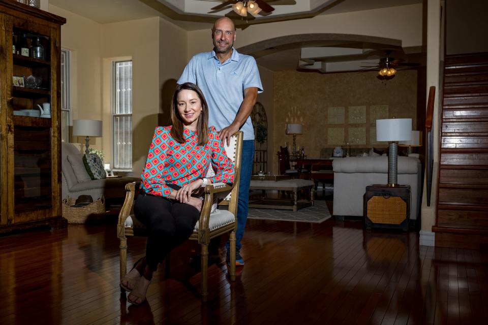 Monique and Steffens Poessiger sit in the living room of their home in Sunset Heights, at 604 Stewart Court, on Thursday, Sept. 28, 2023.