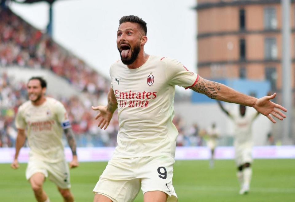 Olivier Giroud celebrates scoring their second goal.