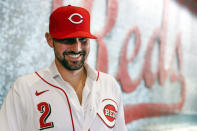 Cincinnati Reds' Nick Castellanos waits for interviews to begin during a news conference announcing his signing with the baseball club, Tuesday, Jan. 28, 2020, in Cincinnati. Castellanos signed a $64 million, four-year deal with the Reds. (AP Photo/John Minchillo)