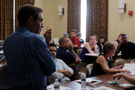 Eric Marcus, creator and host of the "Making Gay History" podcast, participates in a training session with the group History Unerased (HUE), which aims to provide educators with materials about the role lesbian, gay bisexual and transgender people have played in the history of the United States, in Lowell, Massachusetts, U.S., May 18, 2017. REUTERS/Brian Snyder