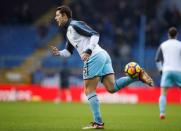 Soccer Football - Premier League - Burnley vs Manchester United - Turf Moor, Burnley, Britain - January 20, 2018 Burnley's James Tarkowski warms up before the match REUTERS/Phil Noble EDITORIAL USE ONLY. No use with unauthorized audio, video, data, fixture lists, club/league logos or "live" services. Online in-match use limited to 75 images, no video emulation. No use in betting, games or single club/league/player publications. Please contact your account representative for further details.