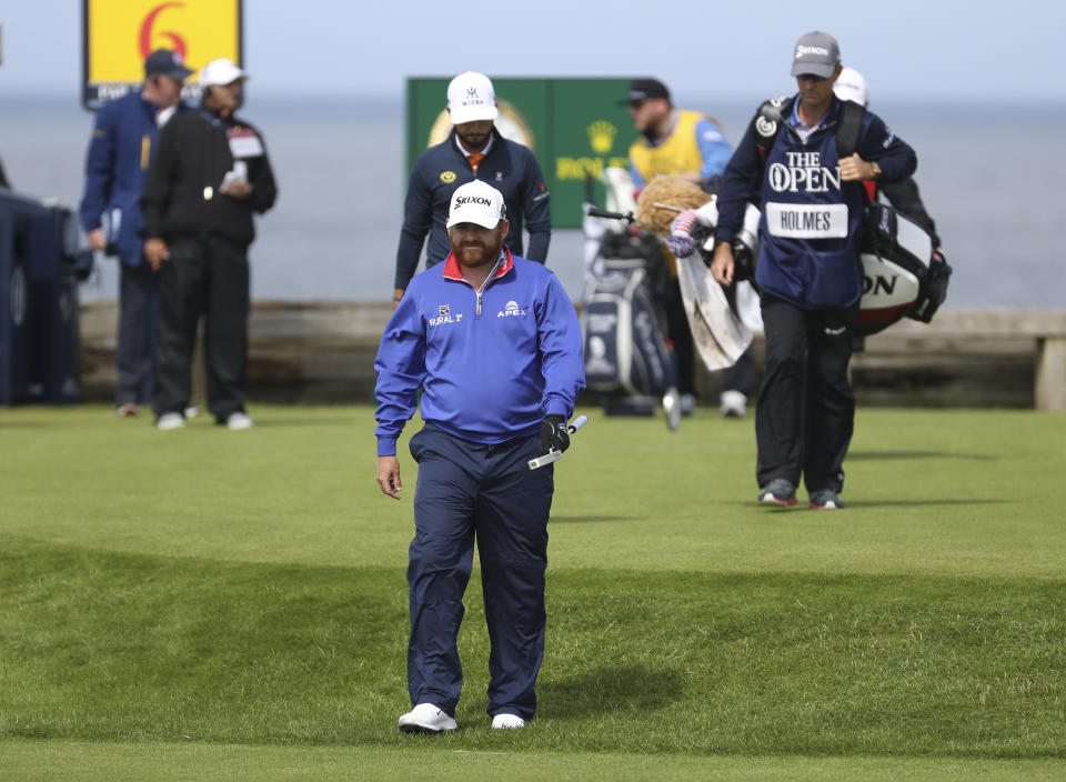 J.B. Holmes of the United States walks from the 6th tee during the first round of the British Open Golf Championships at Royal Portrush in Northern Ireland, Thursday, July 18, 2019.(AP Photo/Peter Morrison)