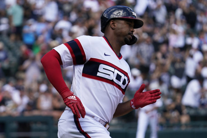 Chicago White Sox's Eloy Jimenez rounds the bases after hitting a solo home run during the seventh inning of a baseball game against the Oakland Athletics in Chicago, Sunday, July 31, 2022. (AP Photo/Nam Y. Huh)