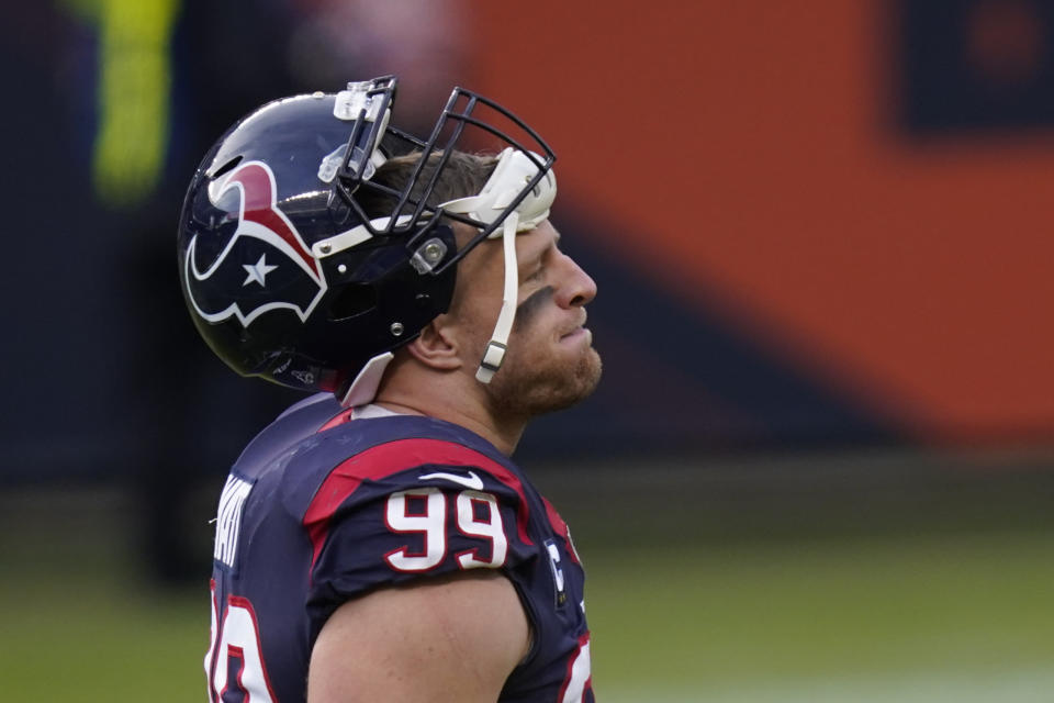 Houston Texans' J.J. Watt walks off the field following an NFL football game against the Chicago Bears, Sunday, Dec. 13, 2020, in Chicago. (AP Photo/Charles Rex Arbogast)