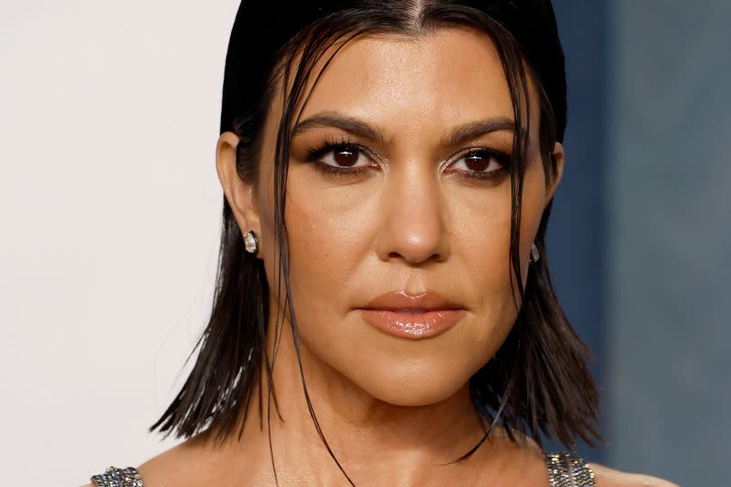 Eagle-eyed trolls accused Kim of intentionally picked a photo in which she looked the best, while others praised Kourtney's postpartum figure, calling her the most 'natural looking'