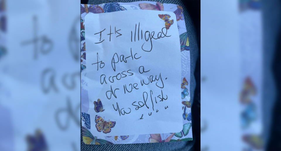 The angry note can be seen handwritten on a butterfly sticker. 