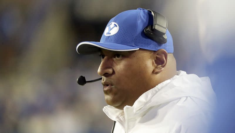 BYU Cougars head coach Kalani Sitake communicates from the sideline in a football game against the Cincinnati Bearcats at LaVell Edwards Stadium in Provo on Friday, Sept. 29, 2023.