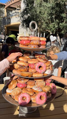 <p>Kourtney Kardashian/Instagram</p> The birthday celebrations included a doughnut birthday cake display