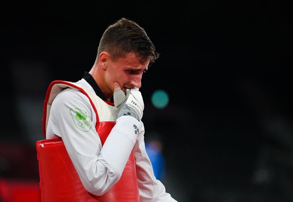 Tokyo , Japan - 24 July 2021; Jack Woolley of Ireland reacts after defeat to Lucas Lautaro Guzman of Argentina in the men's -58Kg taekwondo round of 16 at the Makuhari Messe Hall during the 2020 Tokyo Summer Olympic Games in Tokyo, Japan. (Photo By Brendan Moran/Sportsfile via Getty Images)