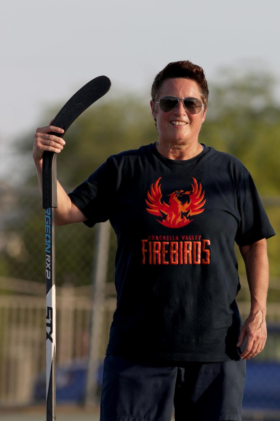 Former Olympic hockey coach Shannon Miller poses for a photograph following the Coachella Valley Firebirds and Acrisure Arena street hockey clinic at Mecca Community Park in Mecca, Calif., on Monday, May 23, 2022. 