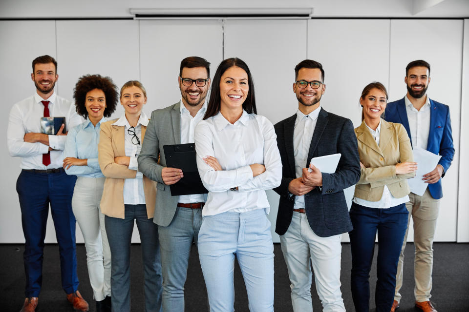 Portrait of successful young business people team in the office