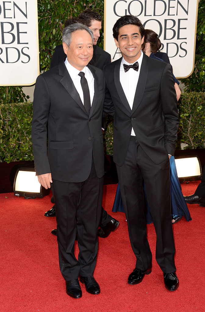 Ang Lee and actor Suraj Sharma arrive at the 70th Annual Golden Globe Awards at the Beverly Hilton in Beverly Hills, CA on January 13, 2013.