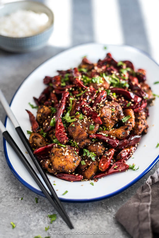 <p>Omnivorescookbook</p><p>A plate of crispy chicken smothered in chili peppers, Sichuan peppercorns, and tons of aromatics to create an electrifyingly hot numbing sensation that’s so addictive. Take the challenge if you can handle the heat! </p><p><strong>Get the recipe: <a href="http://omnivorescookbook.com/mala-chicken/" rel="nofollow noopener" target="_blank" data-ylk="slk:Addictive Sichuan Mala Chicken (辣子鸡, La Zi Ji);elm:context_link;itc:0;sec:content-canvas" class="link rapid-noclick-resp">Addictive Sichuan Mala Chicken (辣子鸡, La Zi Ji)</a></strong></p>