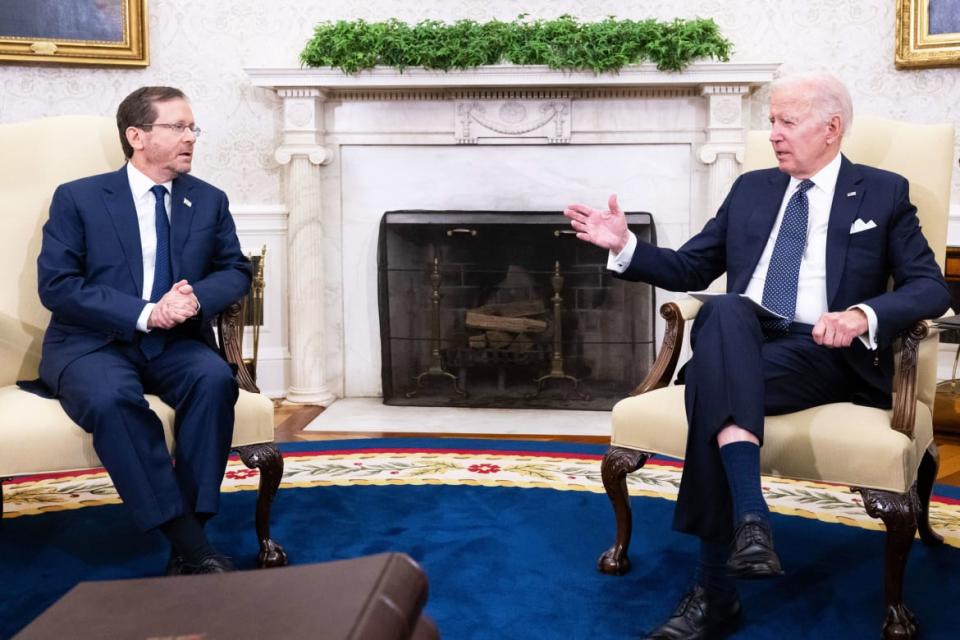 <div class="inline-image__caption"><p>US President Joe Biden (R) speaks during a meeting with Israeli President Isaac Herzog in the Oval Office, on Oct. 26, 2022.</p></div> <div class="inline-image__credit">Saul Loeb/AFP via Getty Images</div>