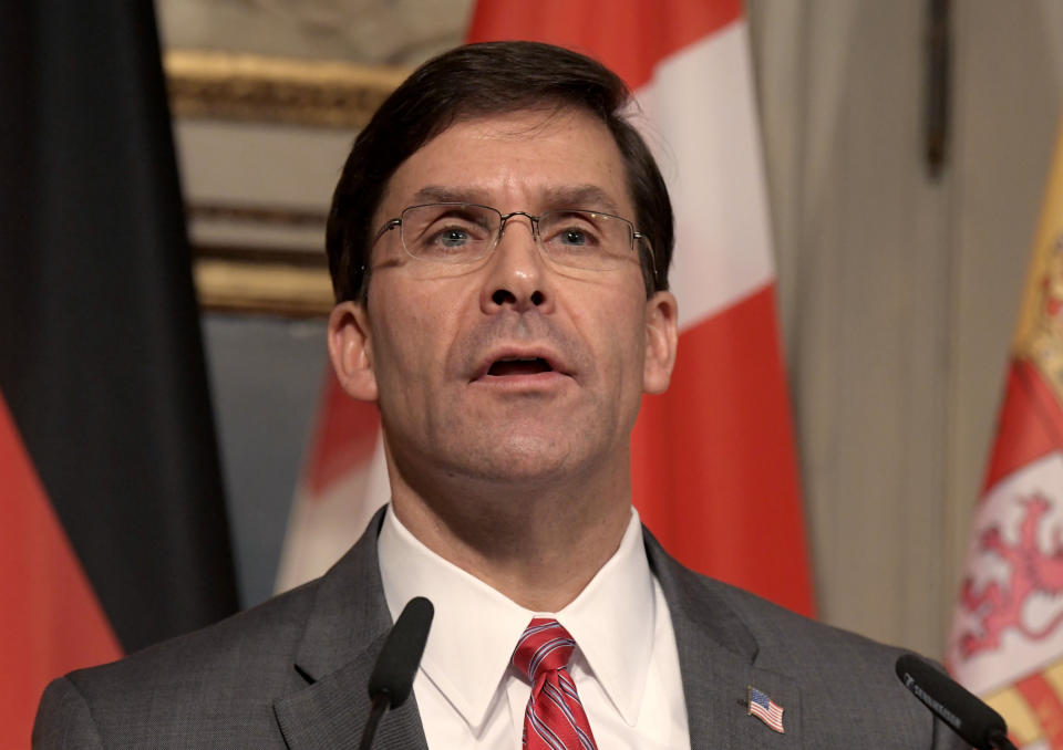 U.S. Secretary for Defense Mark Esper speaks during a press conference on the first day of the Munich Security Conference in Munich, Germany, Friday, Feb. 14, 2020. (AP Photo/Jens Meyer)b