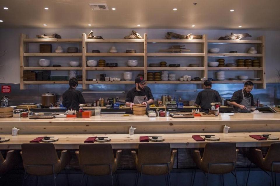 Chefs prepare for dinner at Kru Contemporary Japanese Cuisine on Friday, Feb. 3, 2017, in Sacramento, Calif.