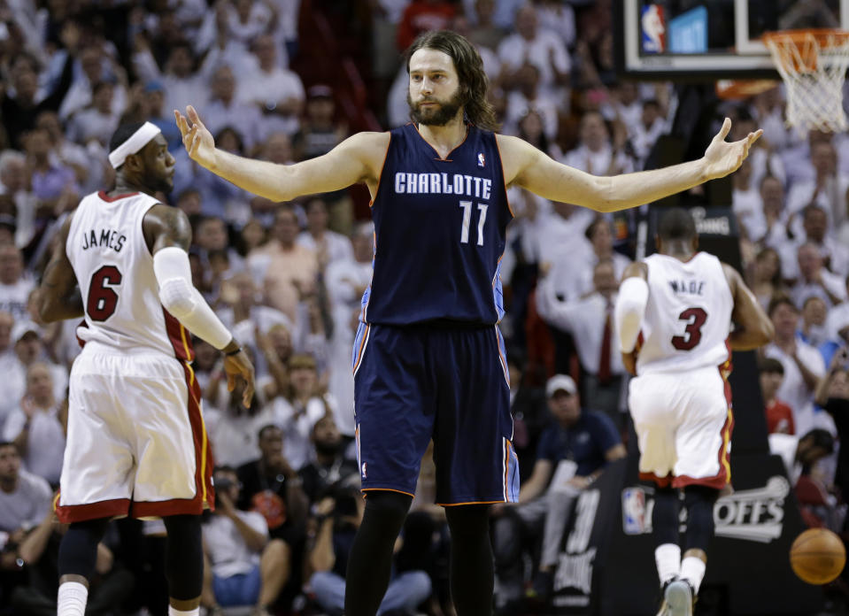 Charlotte Bobcats' Josh McRoberts (11) reacts after being called for a foul during the second half in Game 2 of an opening-round NBA basketball playoff series against the Miami Heat, Wednesday, April 23, 2014, in Miami. The Heat defeated the Bobcats 101-97. (AP Photo/Lynne Sladky)