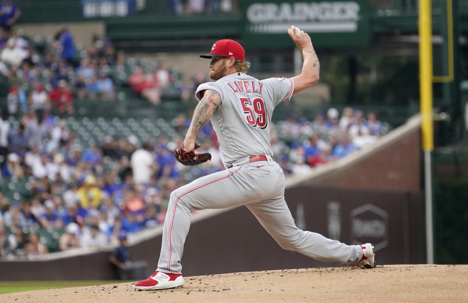 Cincinnati Reds starting pitcher Ben Lively delivers during the first inning of a baseball game against the Chicago Cubs Tuesday, Aug. 1, 2023, in Chicago. (AP Photo/Charles Rex Arbogast)