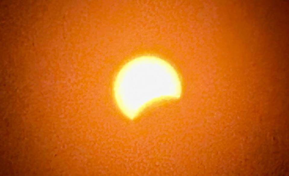 Partial eclipse in Kingston, Ont. through eclipse glasses