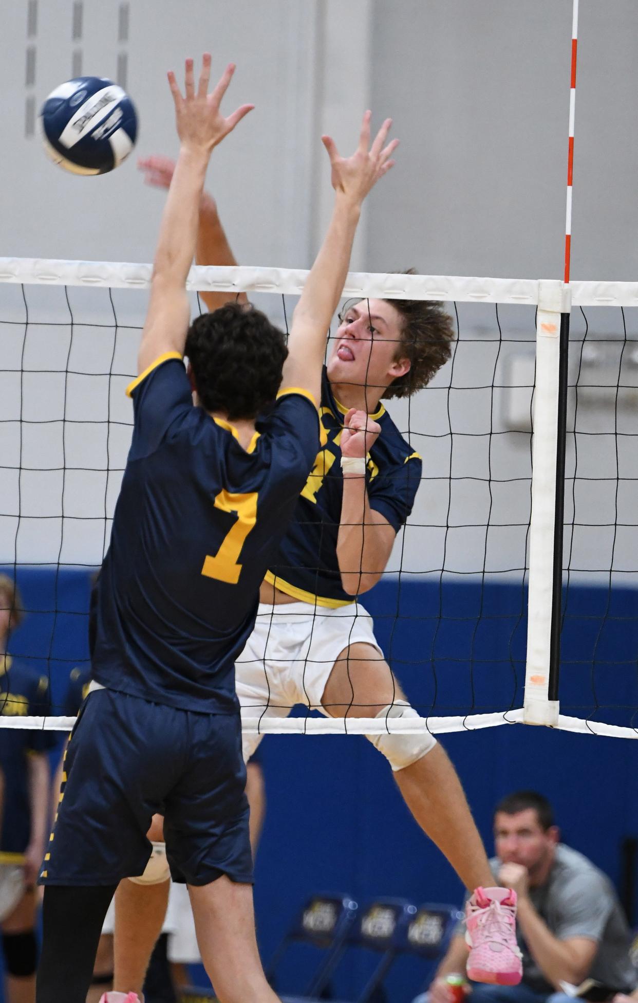 Ryan Gill of Victor hits the ball during the first set.