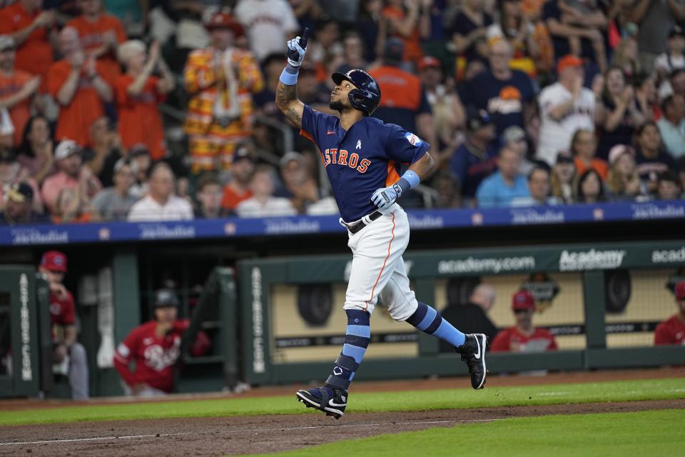 Houston Astros' Corey Julks celebrates after hitting a home run against the Cincinnati Reds during the second inning of a baseball game Sunday, June 18, 2023, in Houston. (AP Photo/David J. Phillip)