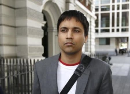 Navinder Sarao (C) leaves Westminster Magistrates Court following the adjournment of his extradition hearing in London, September 25, 2015. REUTERS/Peter Nicholls