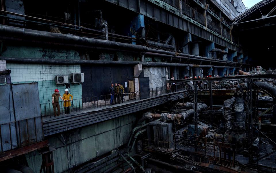 Ukrainian Energy Minister Herman Halushchenko during official visit to a thermal power plant which was destroyed by a Russian rocket attack