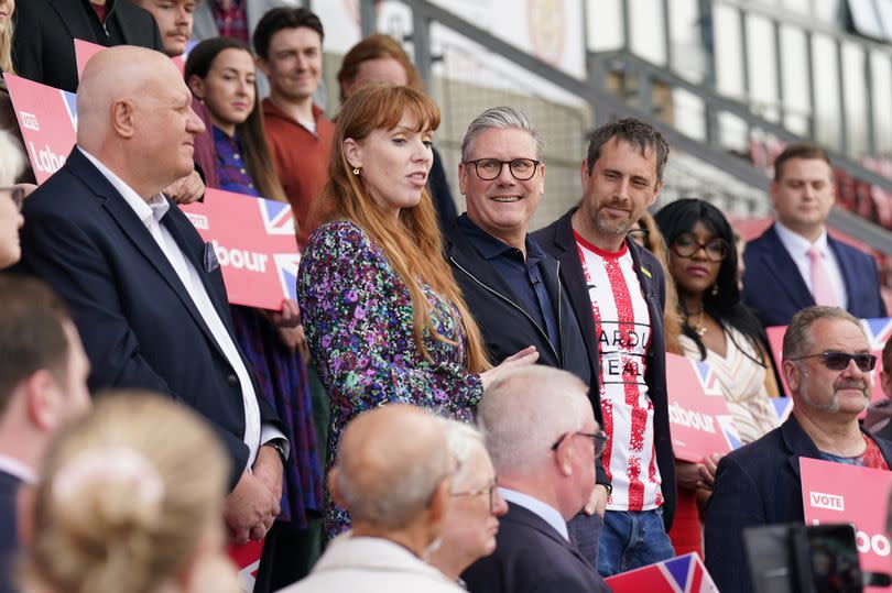 Labour Party leader Sir Keir Starmer with deputy leader Angela Rayner addressing party activists at Harlow Town Football Club