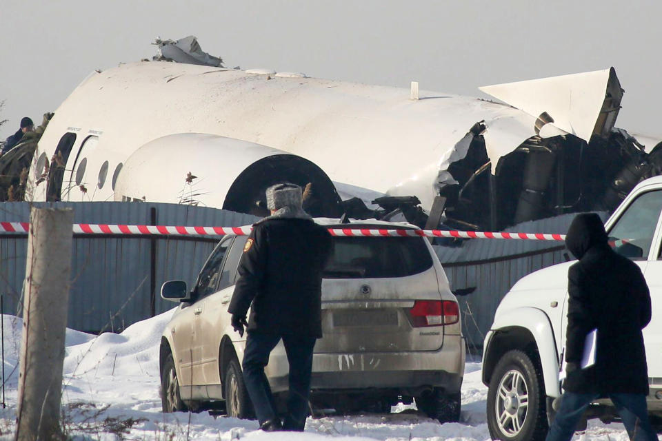 A view of the site of a passenger plane crash outside Almaty on December 27, 2019. - At least 15 people died on December 27, 2019 and dozens were reported injured when a passenger plane carrying 100 people crashed into a house shortly after takeoff from Kazakhstan's largest city. (Photo by Ruslan PRYANIKOV / AFP) (Photo by RUSLAN PRYANIKOV/AFP via Getty Images)