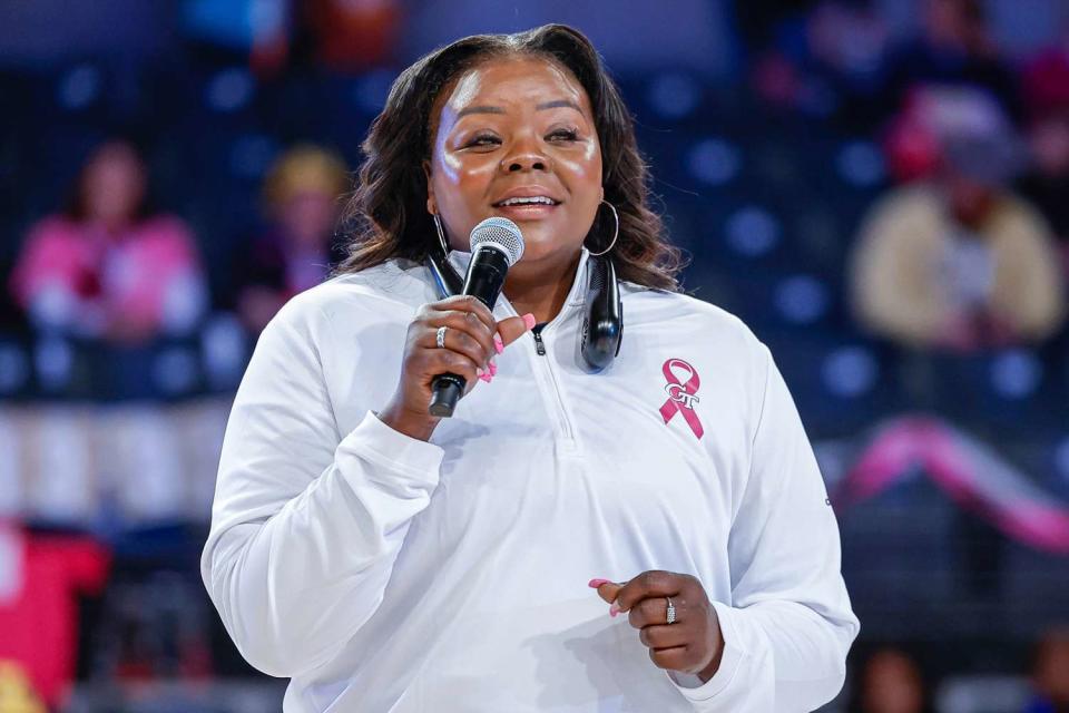 <p>Cal Sport Media via AP</p> Georgia Tech Associate Head Coach, Tasha Butts, discusses her own battle with breast cancer during the NCAA women