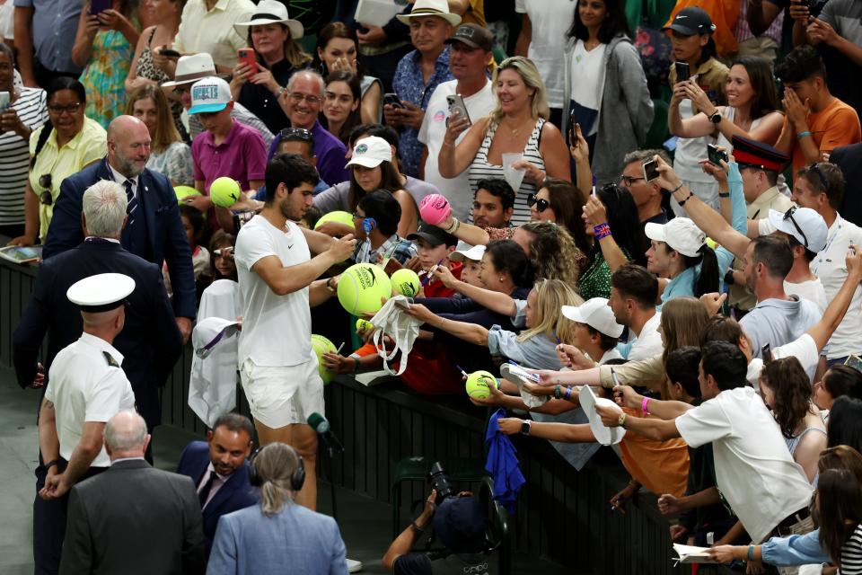 Matteo Berrettini stayed on Centre Court for some time, signing autographs (Getty Images)