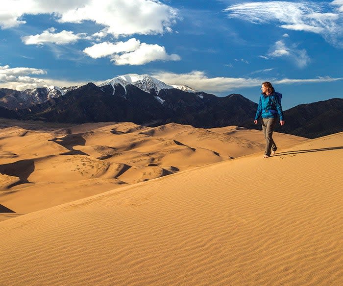 Hiker at Great Sand Dunes National Park in Colorado