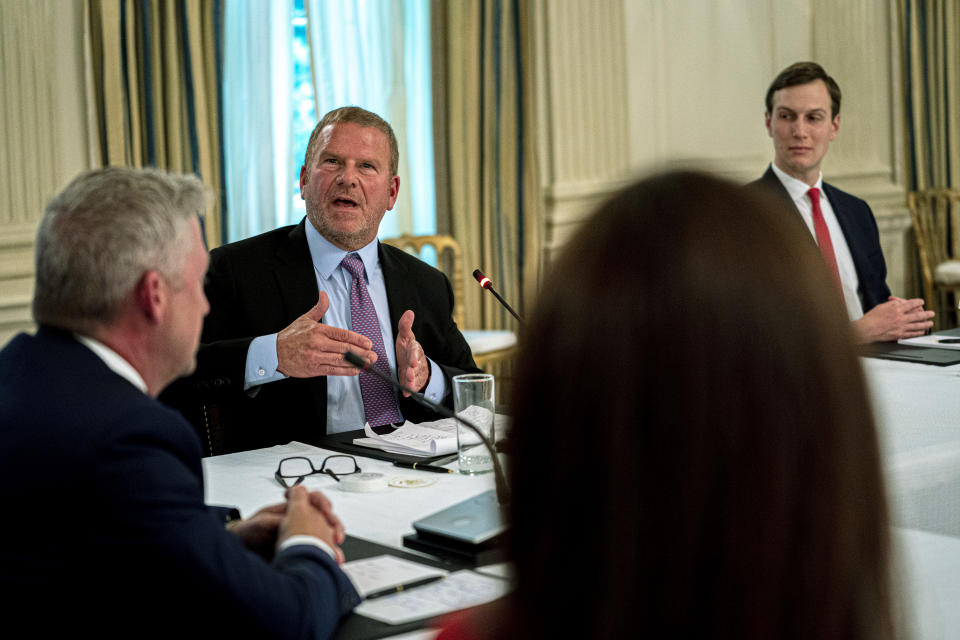 Tilman Fertitta, owner of the Houston Rockets, makes remarks towards President Donald Trump during a roundtable in the State Dining Room of the White House on May 18, 2020, in Washington, DC.