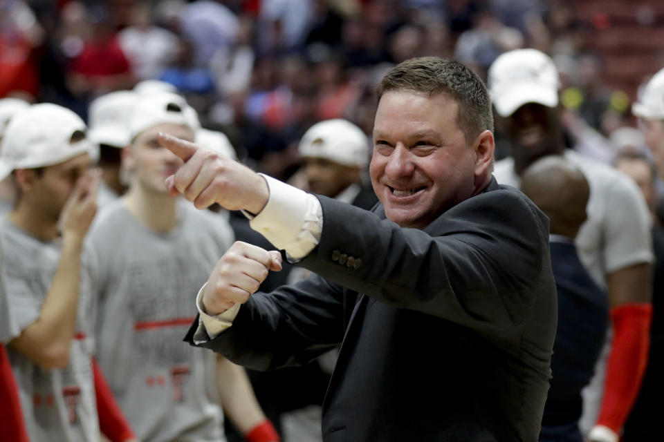 Texas Tech head coach Chris Beard celebrates after the team's win against Gonzaga during the West Regional final in the NCAA men's college basketball tournament Saturday, March 30, 2019, in Anaheim, Calif. Texas Tech won 75-69. (AP Photo/Marcio Jose Sanchez)